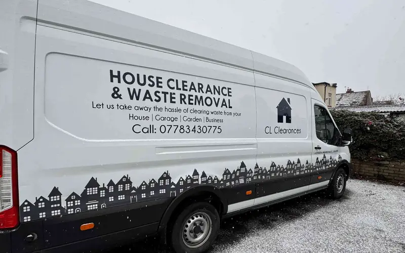 CL Clearances van parked on a gravel drive, signwritten with the company name and phone number