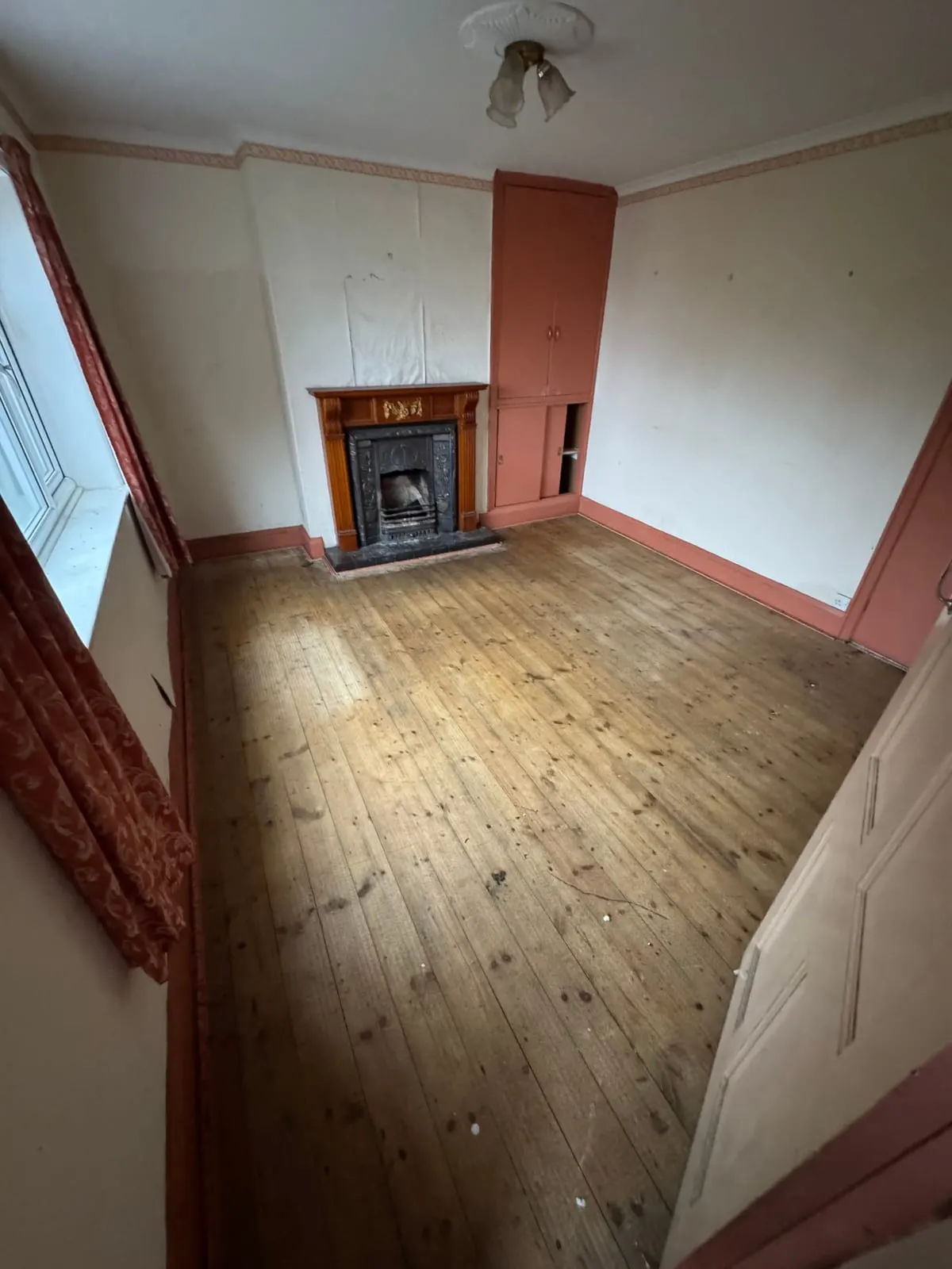 A stripped-out room during a renovation